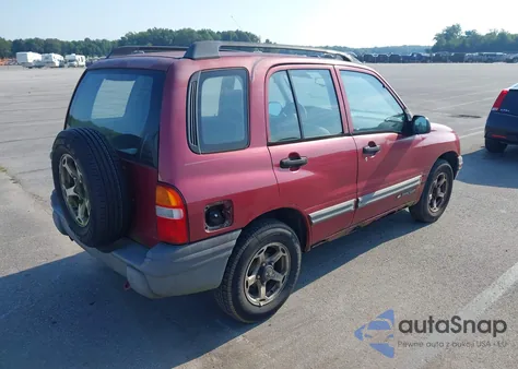 1999 Chevrolet Tracker from USA, damaged, VIN 2CNBJ13C8X6932848